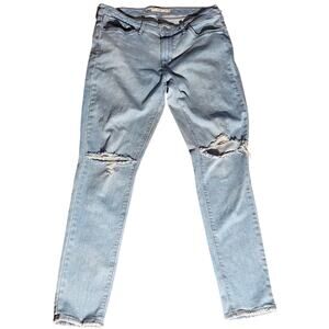 Distressed Levi's Light Blue Jeans 711 Skinny - W31 L30